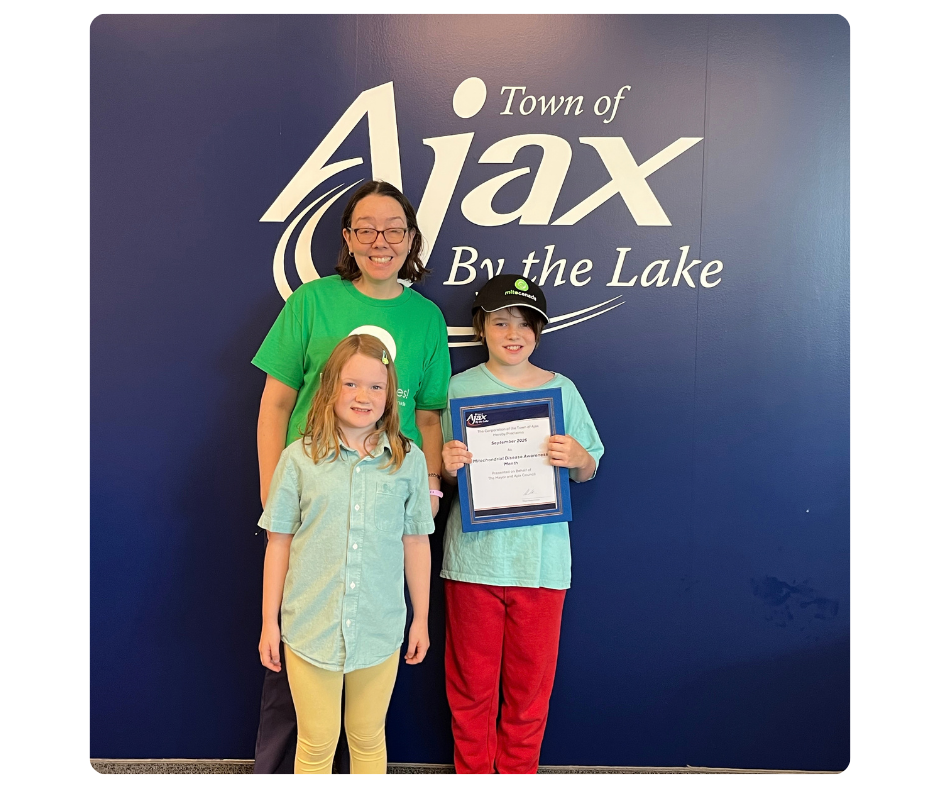 Courtney and Clyde with the Clearview County World Mitochondrial Disease Week Proclamation 2025
